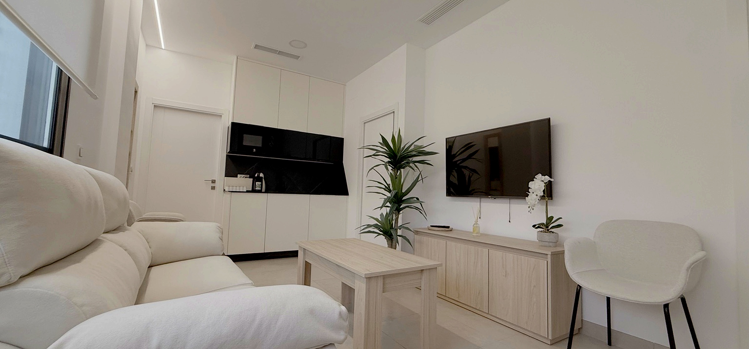 Salón del Apartamento El Rincón, zona de estar principal